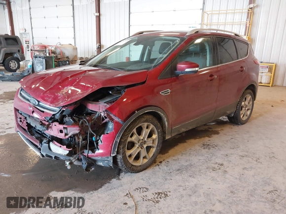 2014 Ford Escape Titanium with VIN 1FMCU0JX6EUC58726, listed as a IAAI auction lot 41656779 with 162,888 mi miles. Bid and sale history available at carsss.com. Image 2.