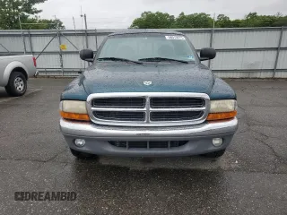1999 Dodge Dakota SLT с VIN 1B7GL22X8XS268188, выставлен на аукционе Copart как лот 58015675 с пробегом 164 998 миль миль и Списание • Salvage title. История ставок и продаж доступна на DreamBid. Изображение 5.