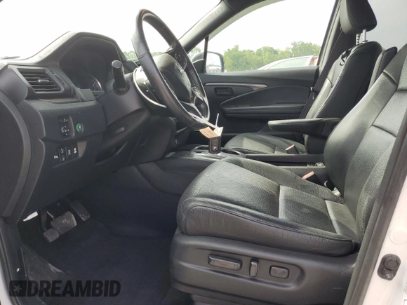 2023 Honda Passport EX-L with VIN 5FNYF8H58PB024039, listed as a Copart auction lot 57269725 with 44,705 mi miles and Salvage title. Bid and sale history available at DreamBid. Image 7.