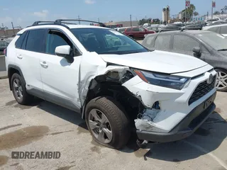 2022 Toyota RAV4 Hybrid XLE with VIN 2T3RWRFV9NW130472, listed as a IAAI auction lot 40990707 with 156,174 mi miles and . Bid and sale history available at DreamBid. Image 1.
