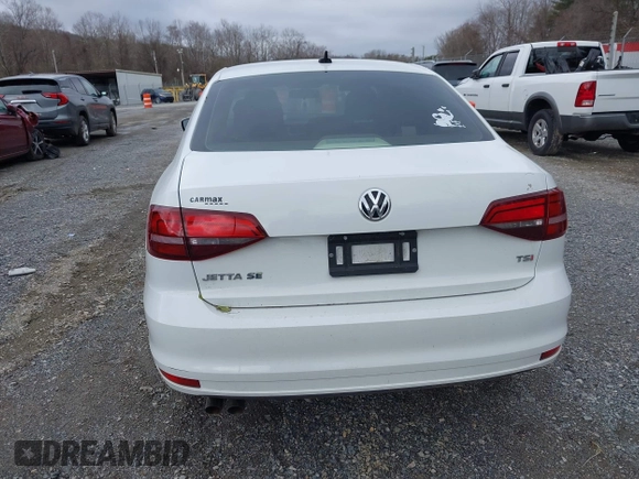 2016 Volkswagen Jetta Sedan 1.4T SE with VIN 3VWD67AJ3GM392427, listed as a IAAI auction lot 41704763 with 84,152 mi miles. Bid and sale history available at carsss.com. Image 16.