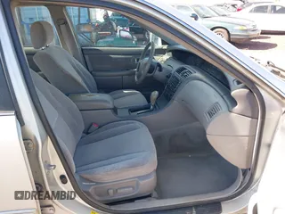 2003 Toyota Avalon XL z VIN 4T1BF28B93U274928, wystawiony jako IAAI lot #42034461 z przebiegiem 150 549 mil mil oraz . Historia ofert i sprzedaży dostępna na DreamBid. Obrazek 5.