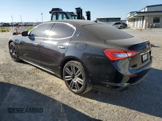 2018 Maserati Ghibli with VIN ZAM57XSA4J1268685, listed as a Copart auction lot 62302313 with 76,576 mi miles. Bid and sale history available at carsss.com. Image 2.