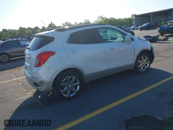 2016 Buick Encore Premium with VIN KL4CJDSB1GB647306, listed as a IAAI auction lot 41983159 with 59,592 mi miles. Bid and sale history available at carsss.com. Image 4.