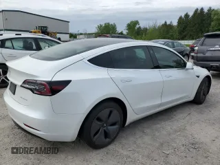 2020 Tesla Model 3 Long Range z VIN 5YJ3E1EB9LF801059, wystawiony jako Copart lot #58312495 z przebiegiem Nie podano mil oraz Szkoda całkowita • Salvage title. Historia ofert i sprzedaży dostępna na DreamBid. Obrazek 3.
