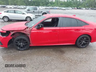 2022 Honda Civic Sport z VIN 2HGFE2F51NH605045, wystawiony jako IAAI lot #42352645 z przebiegiem 28 151 mil mil oraz . Historia ofert i sprzedaży dostępna na DreamBid. Obrazek 14.