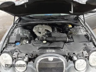 2005 Jaguar S-Type with VIN SAJWA01T85FN43991, listed as a IAAI auction lot 42055271 with 114,454 mi miles and . Bid and sale history available at DreamBid. Image 10.