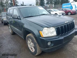 2005 Jeep Grand Cherokee Laredo with VIN 1J4HS48N45C524871, listed as a IAAI auction lot 41920807 with 169,633 mi miles. Bid and sale history available at carsss.com. Image 1.