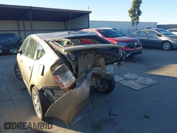 2005 Toyota Prius with VIN JTDKB20U453040279, listed as a IAAI auction lot 41335444 with 204,689 mi miles and . Bid and sale history available at DreamBid. Image 6.