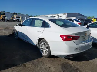 2018 Chevrolet Malibu LT z VIN 1G1ZD5ST1JF215880, wystawiony jako IAAI lot #42025365 z przebiegiem 100 587 mil mil oraz . Historia ofert i sprzedaży dostępna na DreamBid. Obrazek 3.