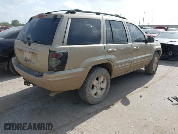 2001 Jeep Grand Cherokee Limited with VIN 1J4GW58N51C575036, listed as a IAAI auction lot 42573849 with 223,757 mi miles and . Bid and sale history available at DreamBid. Image 4.