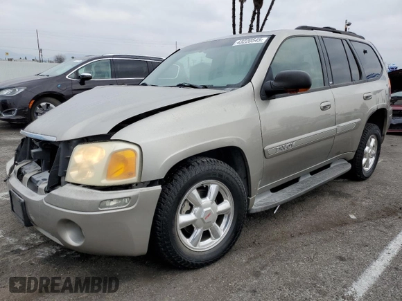 2003 GMC Envoy SLE with VIN 1GKDS13S232236886, listed as a Copart auction lot 43220545 with 58,229 mi miles and Salvage Title. Bid and sale history available at carsss.com. Image 1.