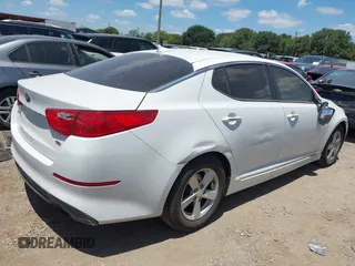 2015 Kia Optima LX with VIN KNAGM4A74F5605007, listed as a IAAI auction lot 42796438 with 126,819 mi miles and . Bid and sale history available at DreamBid. Image 4.