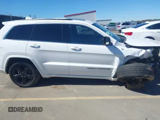 2015 Jeep Grand Cherokee Altitude with VIN 1C4RJEAG4FC815743, listed as a IAAI auction lot 41815095 with 106,867 mi miles. Bid and sale history available at carsss.com. Image 14.