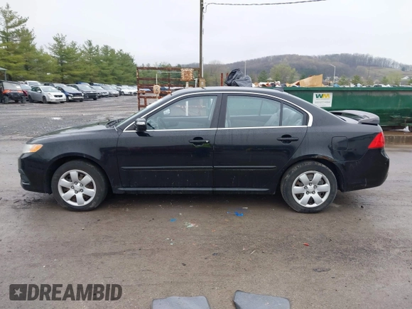 2010 Kia Optima LX with VIN KNAGG4A8XA5393660, listed as a IAAI auction lot 42006529 with 192,588 mi miles. Bid and sale history available at carsss.com. Image 14.