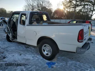 2003 Ford F-150 XL with VIN 1FTRX17W63NA12390, listed as a Copart auction lot 42127405 with 282,656 mi miles and Salvage Title. Bid and sale history available at carsss.com. Image 2.