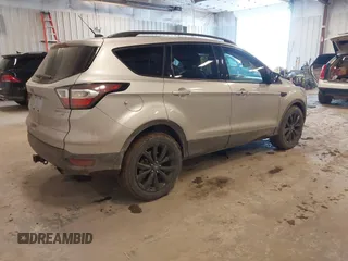 2017 Ford Escape Titanium with VIN 1FMCU9J94HUD92984, listed as a IAAI auction lot 41708720 with 176,550 mi miles. Bid and sale history available at carsss.com. Image 4.