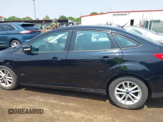 2017 Ford Focus SE with VIN 1FADP3F25HL292056, listed as a IAAI auction lot 42409320 with 102,956 mi miles and . Bid and sale history available at DreamBid. Image 14.