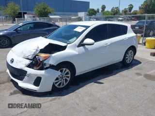2013 Mazda 3 i Touring with VIN JM1BL1LP5D1765199, listed as a IAAI auction lot 42408314 with 137,720 mi miles and . Bid and sale history available at DreamBid. Image 2.