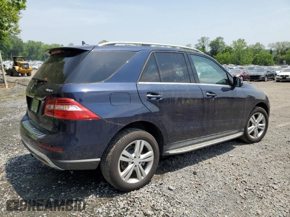 2015 Mercedes-Benz M 350 with VIN 4JGDA5HB2FA529997, listed as a Copart auction lot 59504795 with 69,872 mi miles and Salvage title. Bid and sale history available at DreamBid. Image 3.