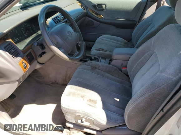 1998 Toyota Avalon XL with VIN 4T1BF18B9WU271848, listed as a Copart auction lot 49508095 with Not Provided miles and Salvage Title. Bid and sale history available at DreamBid. Image 7.
