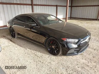 2019 Mercedes-Benz CLS with VIN WDD2J5KB3KA014592, listed as a IAAI auction lot 42074216 with 115,242 mi miles. Bid and sale history available at carsss.com. Image 1.