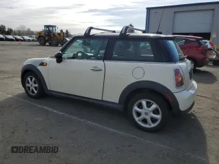 2010 MINI Hardtop with VIN WMWMF3C57ATU77370, listed as a Copart auction lot 50078605 with 187,187 mi miles and Salvage title. Bid and sale history available at DreamBid. Image 2.