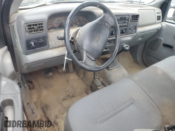 2002 Ford F-350 XL with VIN 1FTSF31F12EB21069, listed as a Copart auction lot 84287374 with 110,890 mi miles and Salvage Title. Bid and sale history available at DreamBid. Image 8.