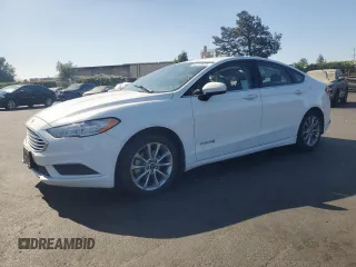 2017 Ford Fusion Hybrid SE z VIN 3FA6P0LU7HR385949, wystawiony jako Copart lot #62575535 z przebiegiem Nie podano mil oraz Szkoda całkowita • Salvage title. Historia ofert i sprzedaży dostępna na DreamBid. Obrazek 1.