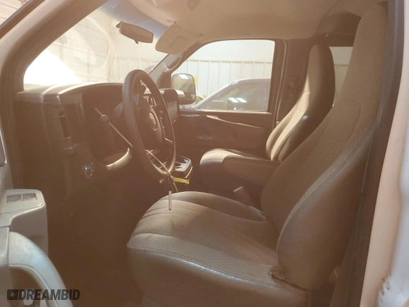 2014 Chevrolet Express Passenger LT with VIN 1GAZG1FG6E1126290, listed as a Copart auction lot 76689113 with 120,518 mi miles and Salvage Title. Bid and sale history available at carsss.com. Image 7.