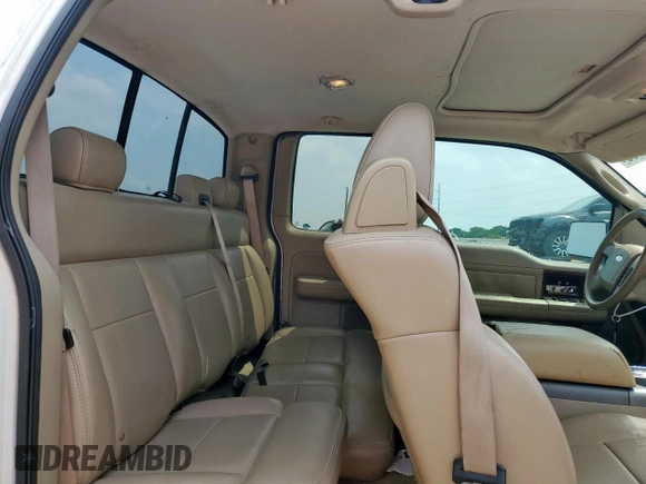2005 Ford F-150 XLT z VIN 1FTRX12595FA60302, wystawiony jako Copart lot #57100065 z przebiegiem 260 397 mil mil oraz Czysty tytuł • Clean title. Historia ofert i sprzedaży dostępna na DreamBid. Obrazek 10.