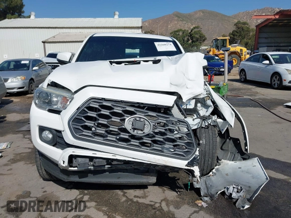 2020 Toyota Tacoma SR5 с VIN 3TMCZ5AN9LM341778, выставлен на аукционе IAAI как лот 42268274 с пробегом 64 767 миль миль и . История ставок и продаж доступна на DreamBid. Изображение 13.
