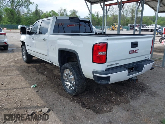 2016 GMC Sierra 2500HD Denali with VIN 1GT12UE86GF267431, listed as a IAAI auction lot 42091770 with 128,525 mi miles and . Bid and sale history available at DreamBid. Image 3.