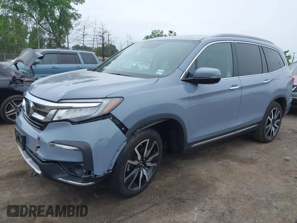 2022 Honda Pilot Touring 7-Passenger with VIN 5FNYF6H68NB056077, listed as a IAAI auction lot 42357338 with 18,193 mi miles and . Bid and sale history available at DreamBid. Image 17.