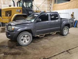 2009 Toyota Tacoma z VIN 3TMLU42N79M027000, wystawiony jako Copart lot #58371365 z przebiegiem 168 989 mil mil oraz Szkoda całkowita • Salvage title. Historia ofert i sprzedaży dostępna na DreamBid. Obrazek 1.