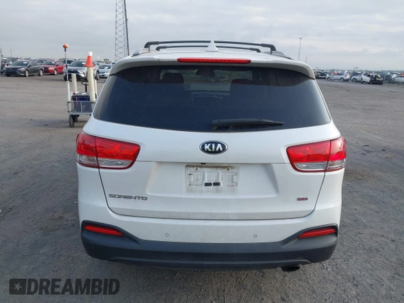 2017 Kia Sorento LX with VIN 5XYPG4A35HG205801, listed as a IAAI auction lot 42143064 with 129,647 mi miles. Bid and sale history available at carsss.com. Image 16.