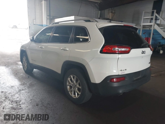 2015 Jeep Cherokee Latitude with VIN 1C4PJMCBXFW784869, listed as a IAAI auction lot 41951297 with 138,396 mi miles. Bid and sale history available at carsss.com. Image 3.