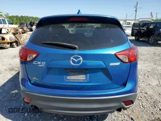 2013 Mazda CX-5 Touring with VIN JM3KE4CE7D0109173, listed as a Copart auction lot 52594285 with 149,288 mi miles and Clean Title. Bid and sale history available at DreamBid. Image 6.