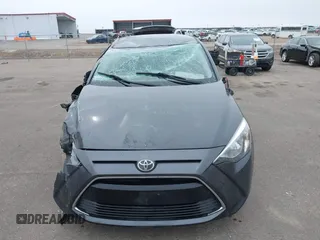 2018 Toyota Yaris with VIN 3MYDLBYV9JY321158, listed as a IAAI auction lot 41937684 with 85,020 mi miles and . Bid and sale history available at DreamBid. Image 12.