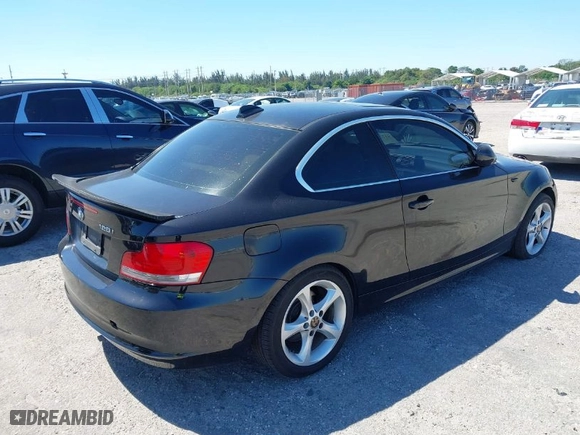 2011 BMW 1 Series 128i with VIN WBAUP7C55BVK78344, listed as a IAAI auction lot 41776367 with 138,351 mi miles. Bid and sale history available at carsss.com. Image 4.