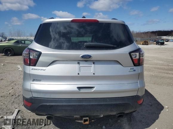 2017 Ford Escape SE with VIN 1FMCU9GD2HUC63427, listed as a Copart auction lot 50571535 with 102,911 mi miles and Salvage Title. Bid and sale history available at carsss.com. Image 6.