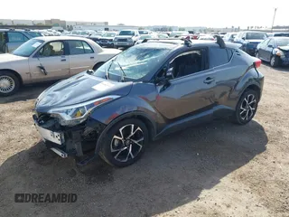 2019 Toyota C-HR XLE with VIN JTNKHMBX3K1018567, listed as a IAAI auction lot 41602932 with 213,386 mi miles and . Bid and sale history available at DreamBid. Image 2.