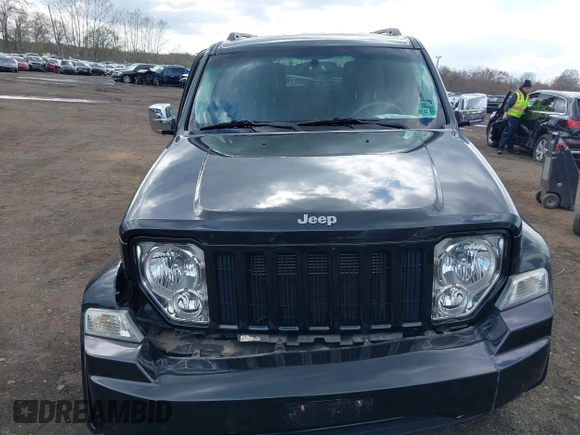 2012 Jeep Liberty Sport z VIN 1C4PJMAK6CW176717, wystawiony jako IAAI lot #42029786 z przebiegiem 38 872 mil mil oraz . Historia ofert i sprzedaży dostępna na DreamBid. Obrazek 18.