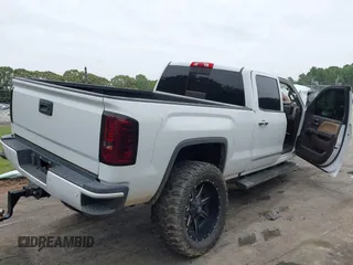 2017 GMC Sierra 2500HD Denali with VIN 1GT12UEG3HF117771, listed as a IAAI auction lot 42334696 with 140,999 mi miles and . Bid and sale history available at DreamBid. Image 4.