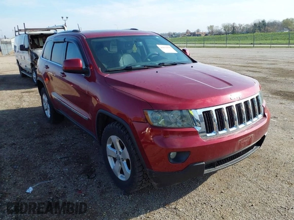 2013 Jeep Grand Cherokee Laredo with VIN 1C4RJEAG9DC538259, listed as a IAAI auction lot 41832676 with 143,000 mi miles. Bid and sale history available at carsss.com. Image 1.