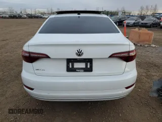 2021 Volkswagen Jetta SEL with VIN 3VWE57BU0MM061395, listed as a Copart auction lot 80946824 with 100,604 mi miles and Salvage title. Bid and sale history available at DreamBid. Image 6.