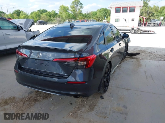 2022 Honda Civic Sedan Sport with VIN 2HGFE2F52NH596002, listed as a IAAI auction lot 41710905 with 33,104 mi miles. Bid and sale history available at carsss.com. Image 4.