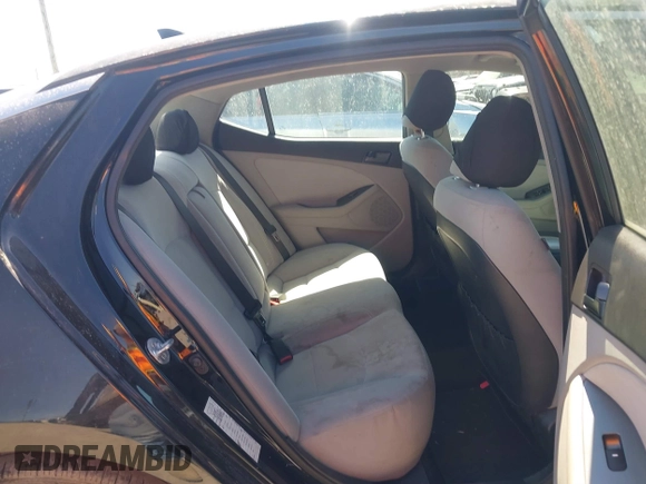 2013 Kia Optima LX with VIN 5XXGM4A75DG149949, listed as a IAAI auction lot 41847004 with 335,621 mi miles. Bid and sale history available at carsss.com. Image 8.