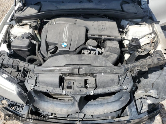 2012 BMW 1 Series 135i with VIN WBAUC9C52CVM12915, listed as a Copart auction lot 67145834 with 114,306 mi miles and Salvage title. Bid and sale history available at DreamBid. Image 11.