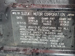 2011 Suzuki SX4 LE z VIN JS2YC5A28B6300625, wystawiony jako Copart lot #54044155 z przebiegiem 179 269 mil mil oraz Szkoda całkowita • Salvage title. Historia ofert i sprzedaży dostępna na DreamBid. Obrazek 12.